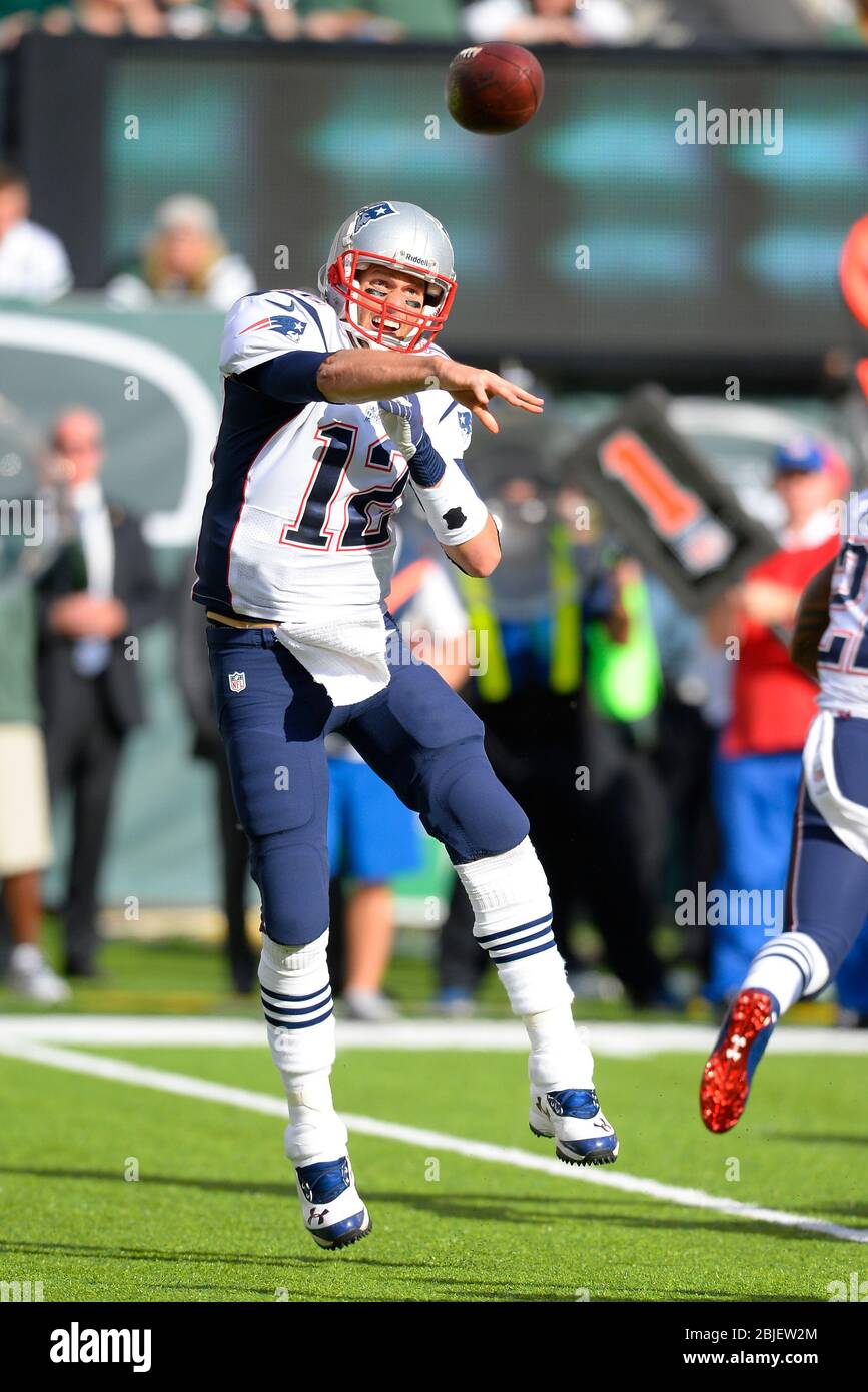 October 20, 2013: New England Patriots quarterback Tom Brady (12) throws a pass during the second half of a week 7 AFC East matchup between the New En Stock Photo