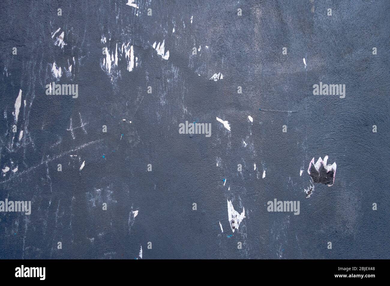 abstract rough backdrop concrete  material surface with riped paper markings Stock Photo
