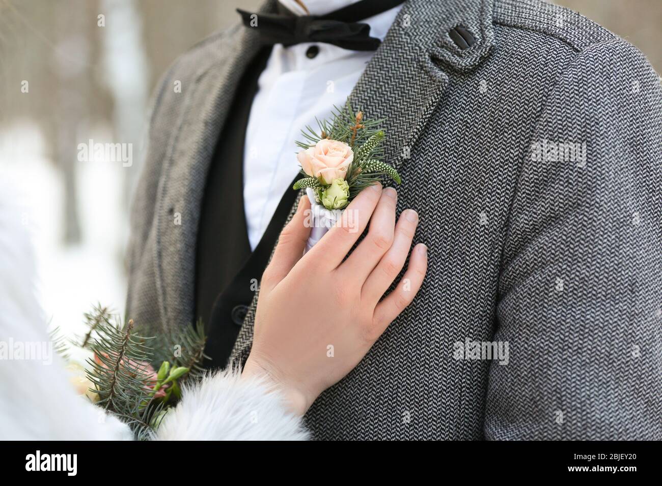Happy wedding couple outdoors on winter day, closeup Stock Photo - Alamy