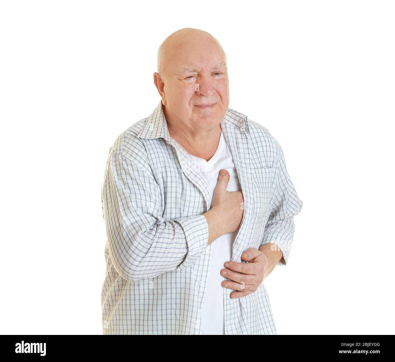 Mature man suffering from pain on white background Stock Photo - Alamy