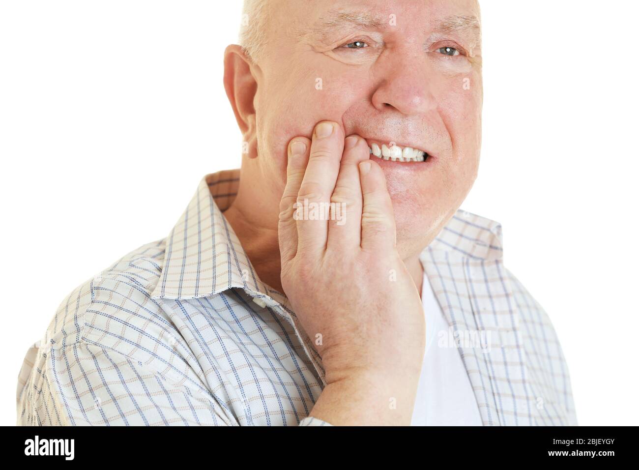 Mature man suffering from pain on white background Stock Photo - Alamy