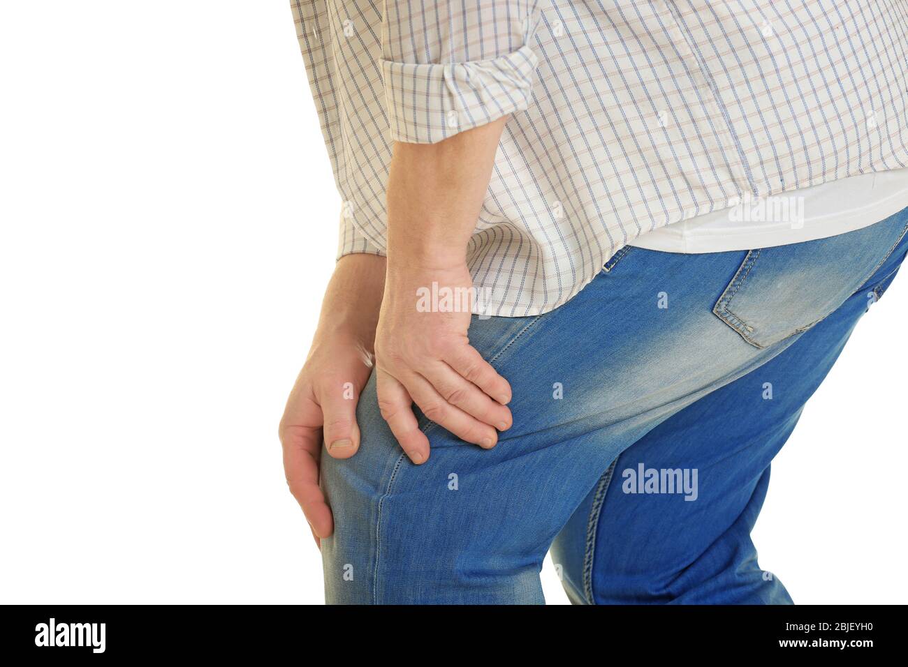 Mature man suffering from pain on white background Stock Photo - Alamy