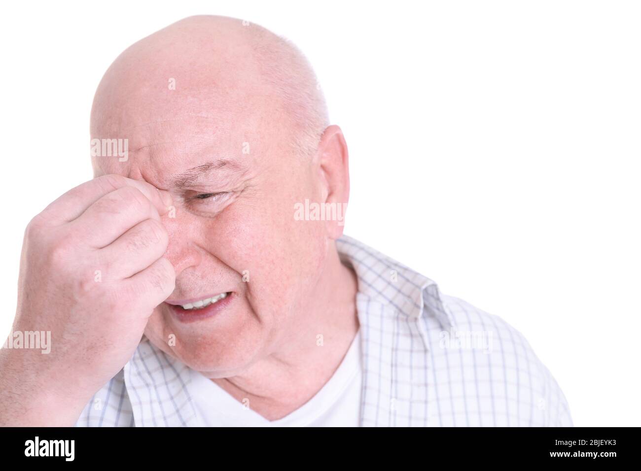 Mature man suffering from pain on white background Stock Photo - Alamy