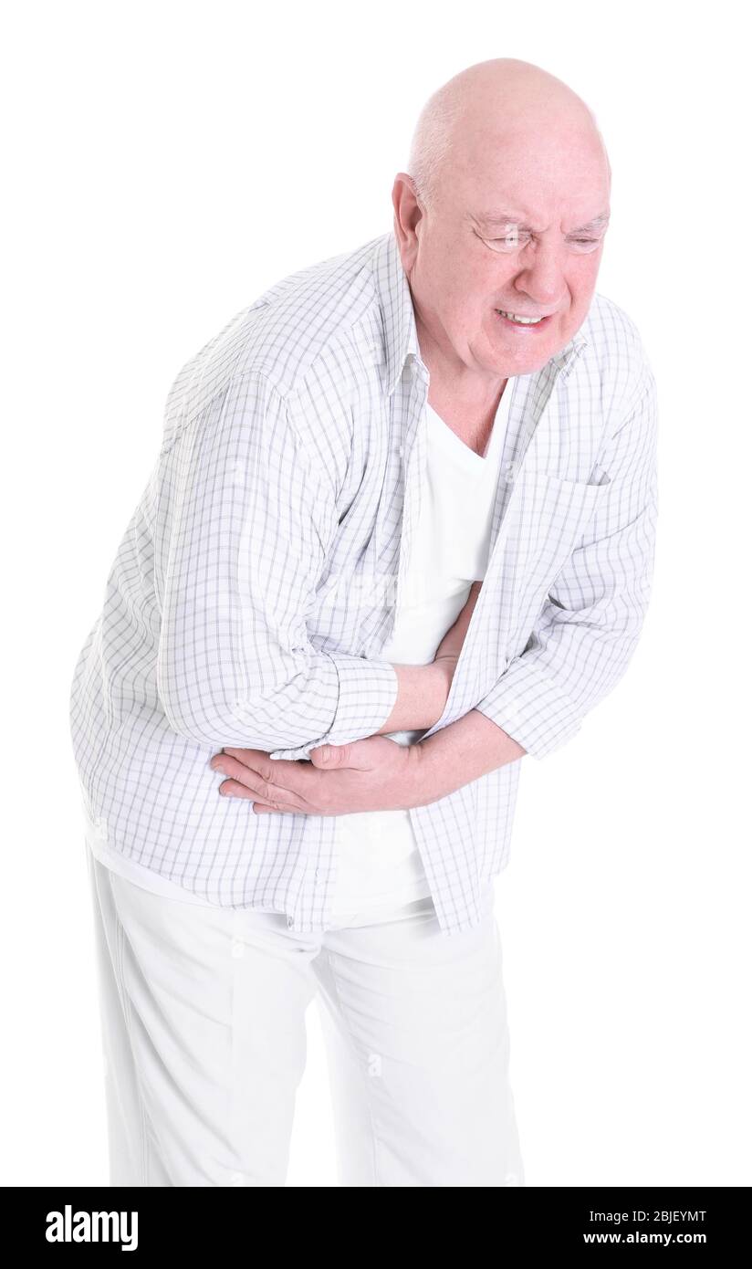 Mature man suffering from pain on white background Stock Photo - Alamy