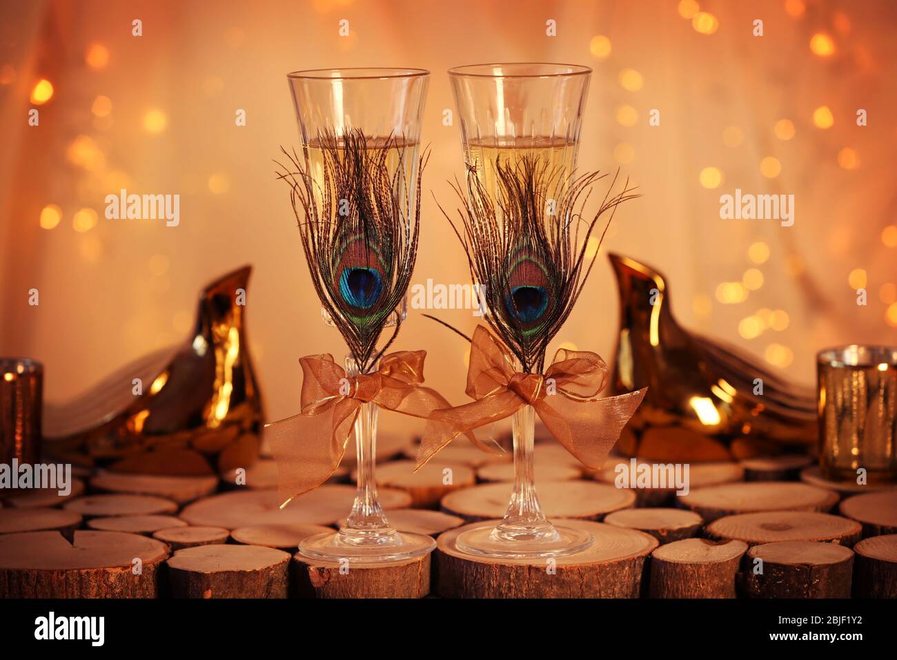 Decorated champagne glasses for wedding on table Stock Photo Alamy