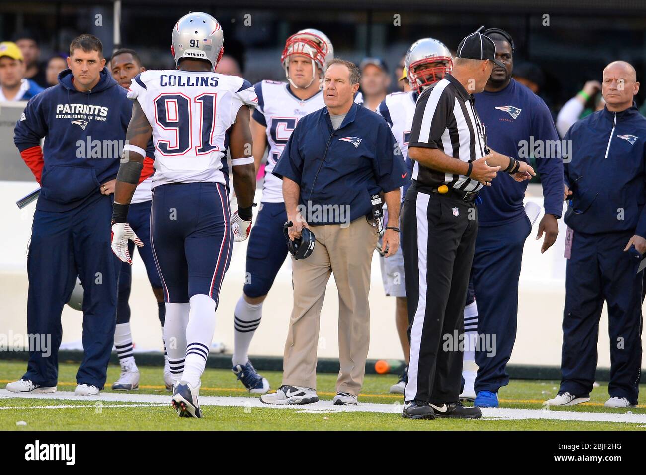 October 20, 2013: New England Patriots head coach Bill Belichick looks on from the bench in the overtime period of a week 7 AFC East matchup between t Stock Photo