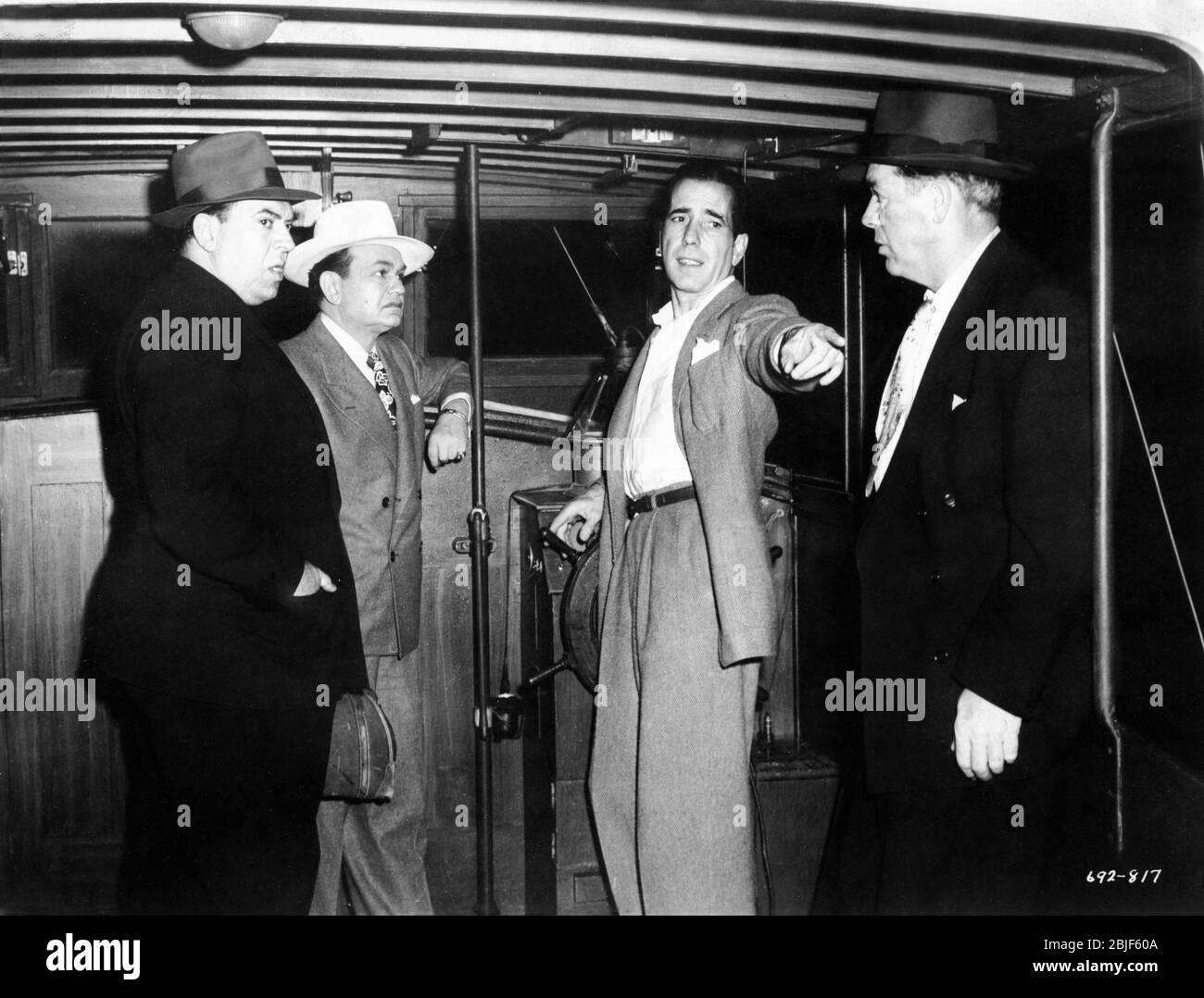 THOMAS GOMEZ EDWARD G. ROBINSON and HUMPHREY BOGART in KEY LARGO 1948 director JOHN HUSTON screenplay RICHARD BROOKS and JOHN HUSTON based on the play by MAXWELL ANDERSON Warner Bros. Stock Photo