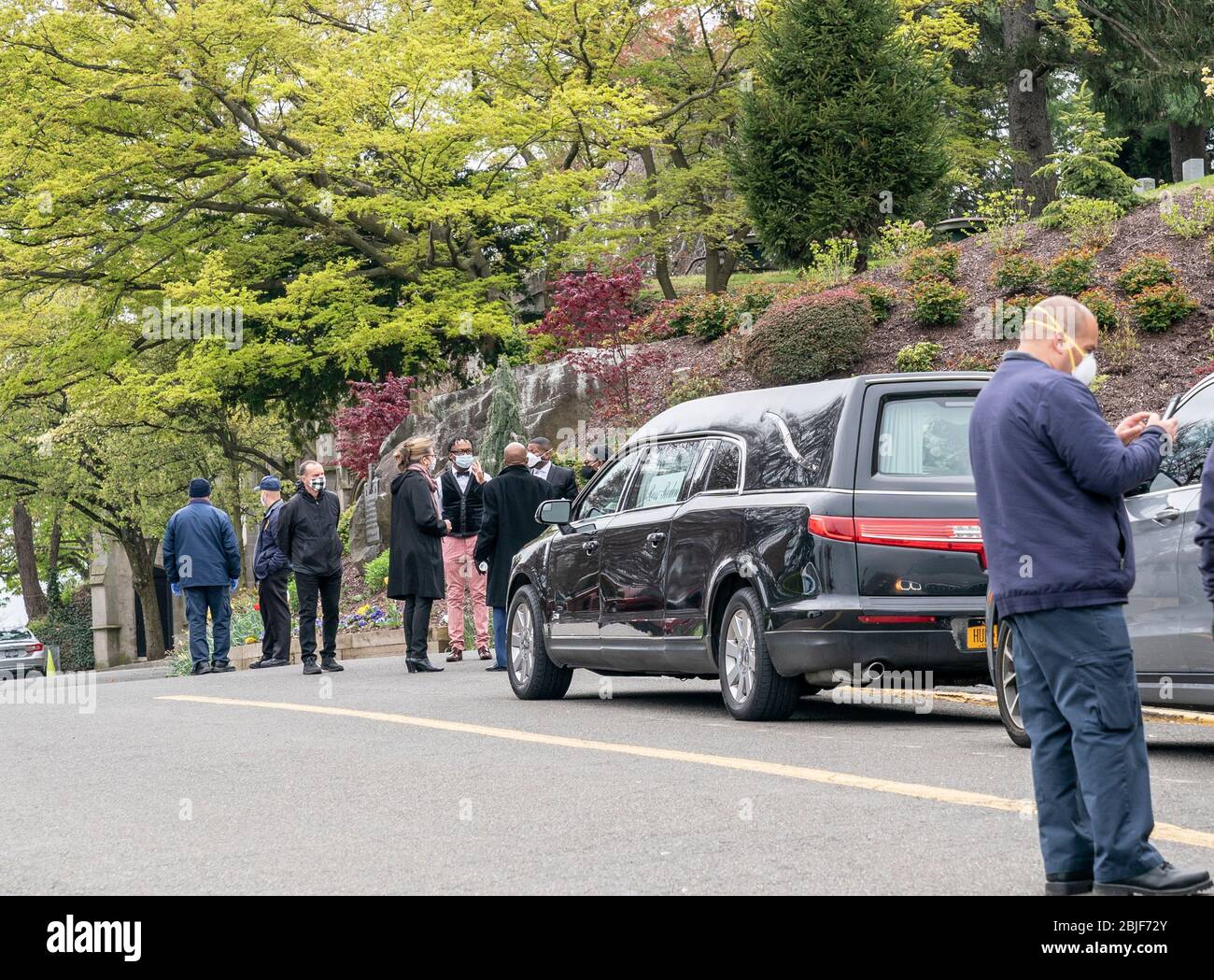 New York, NY - April 29, 2020: Hearse seen on the grounds of Woodlawn Cemetery for burial during COVD-19 pandemic in the Bronx borough Stock Photo