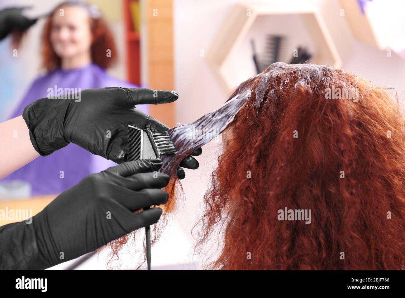 Process of dyeing hair at beauty salon, closeup Stock Photo Alamy