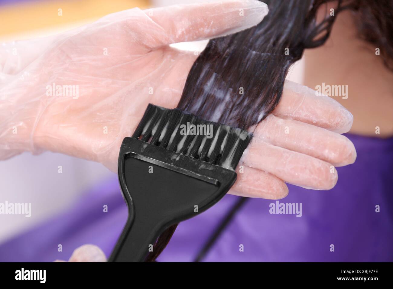 Process of dyeing hair at beauty salon, closeup Stock Photo Alamy