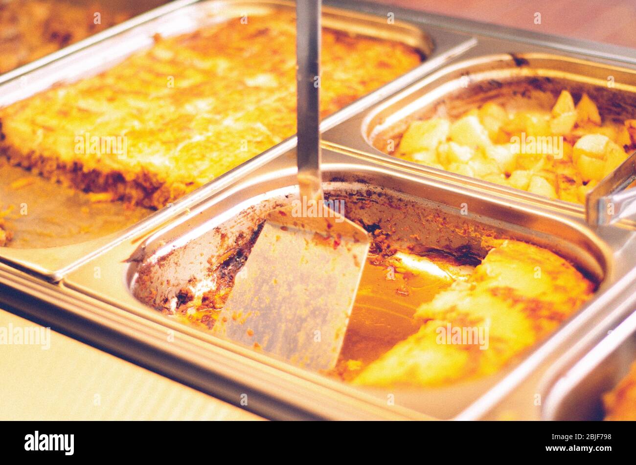 pans in hot bain marie pasticcio containers Stock Photo Alamy
