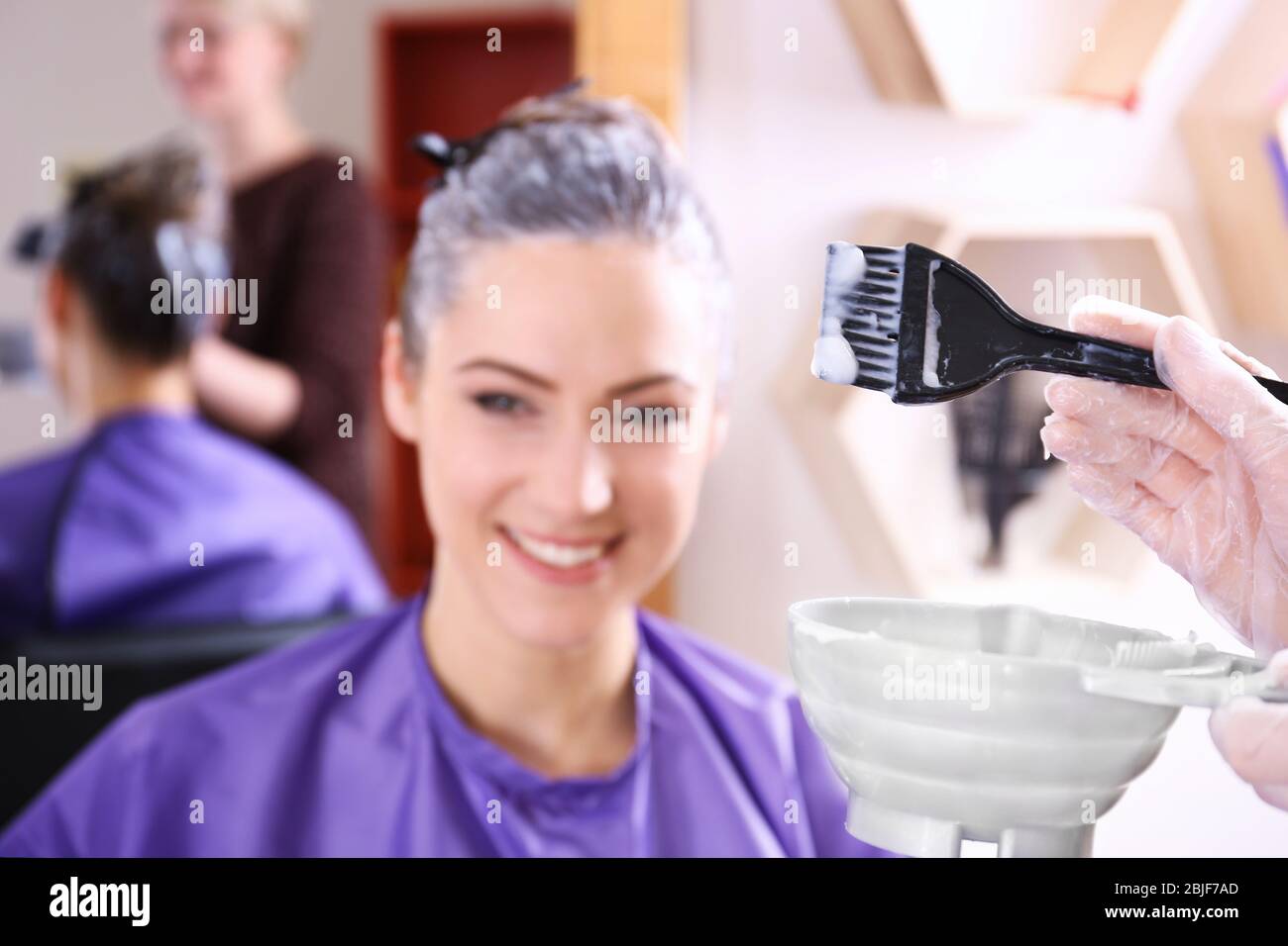 Process of dyeing hair at beauty salon, closeup Stock Photo Alamy