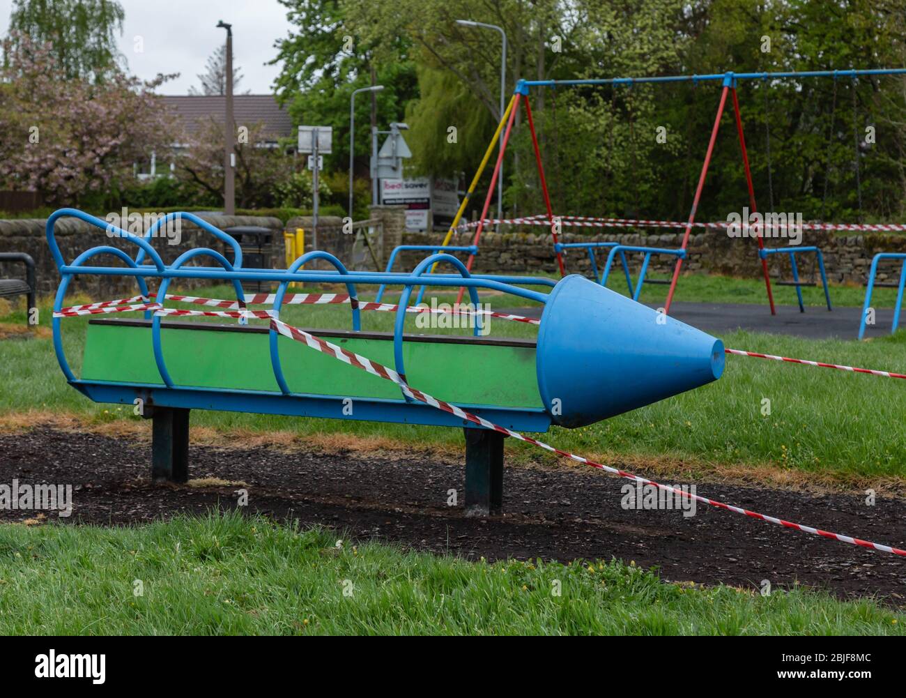 Equipment in a children's playground in Baildon, Yorkshire, taped off