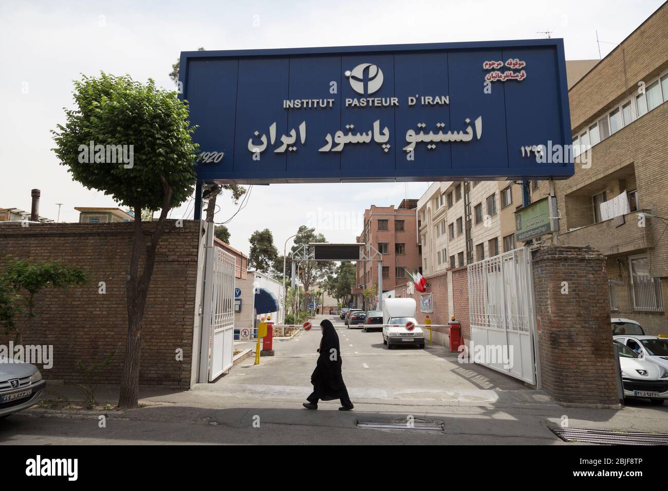 April 29, 2020, Tehran, Iran: A view of the entrance of Pasteur Institute of Iran after a media tour to the key organization fighting infectious diseases within Iran, which was founded in the 1920s in downtown Tehran, Iran. At the century-old Pasteur Institute of Iran, the frontline of the country's fight against the coronavirus outbreak, officials say 15,000 coronavirus tests are being carried out daily. The Pasteur Institute is the leader of the country's 120 laboratories tasked with diagnosing COVID-19 in samples taken from patients across the country and that have confirmed 93,657 cases si Stock Photo