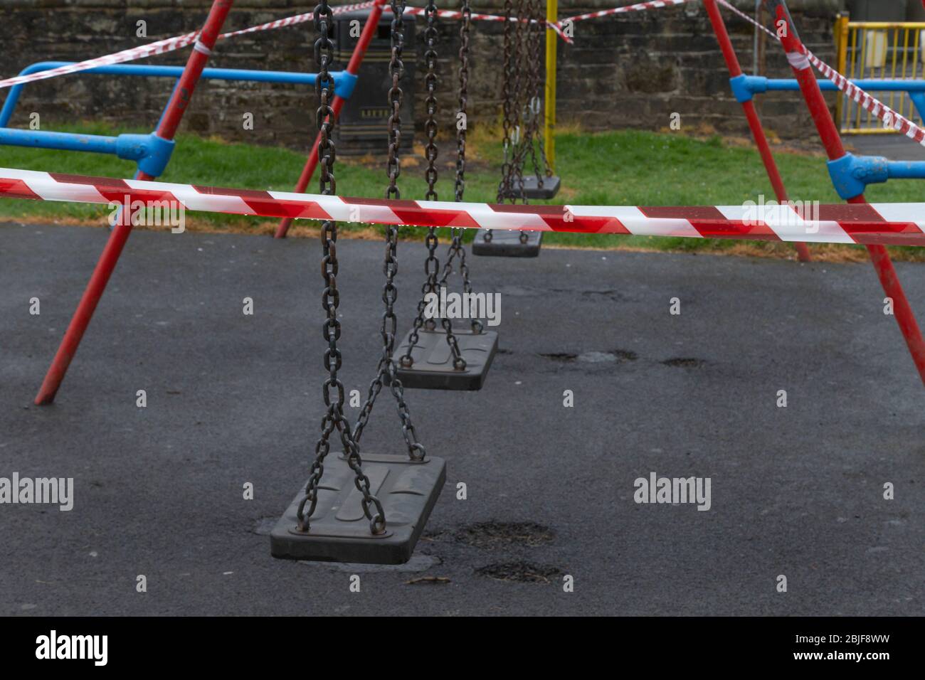 Equipment in a children's playground in Baildon, Yorkshire, taped off