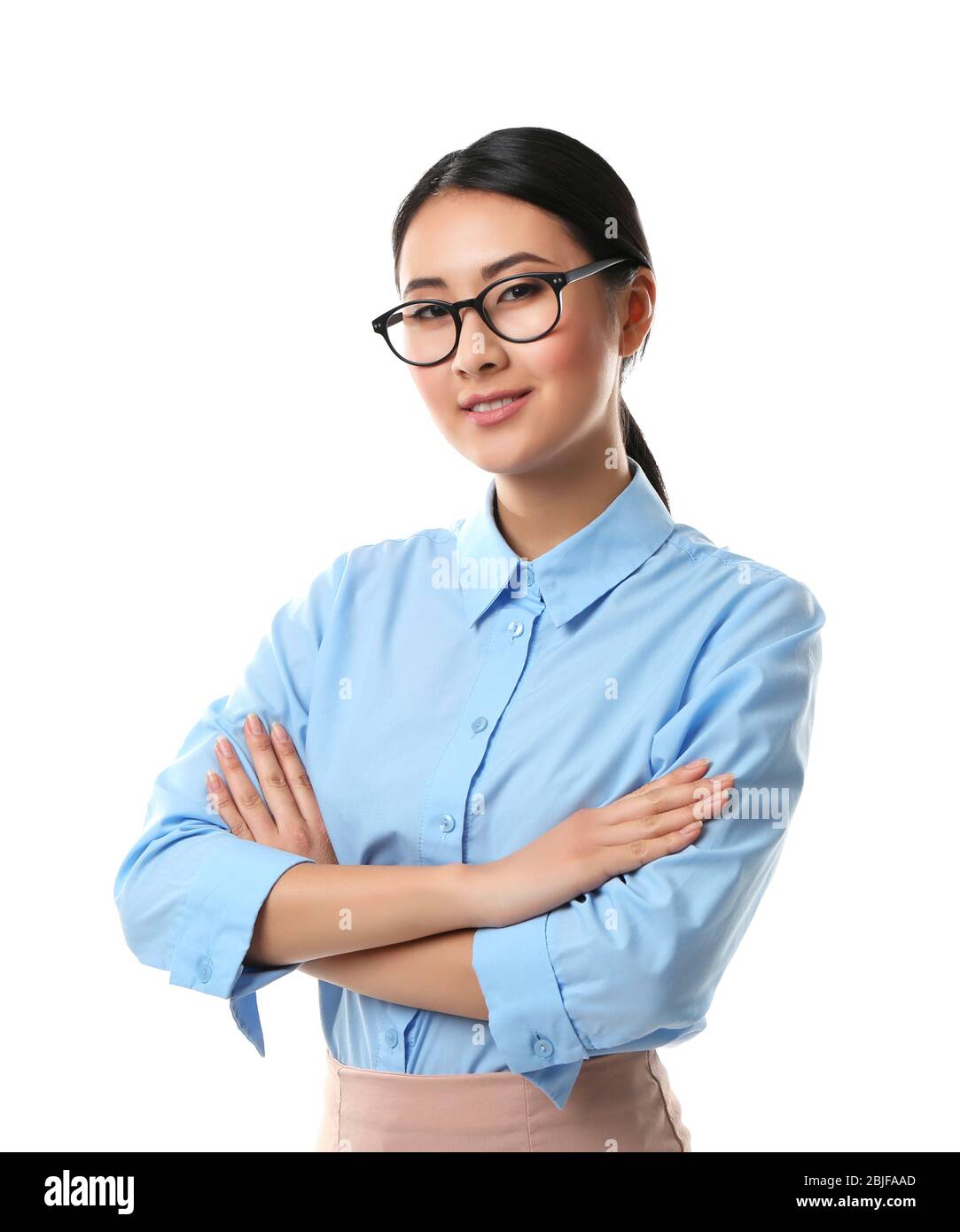Portrait of Asian female teacher isolated on white Stock Photo