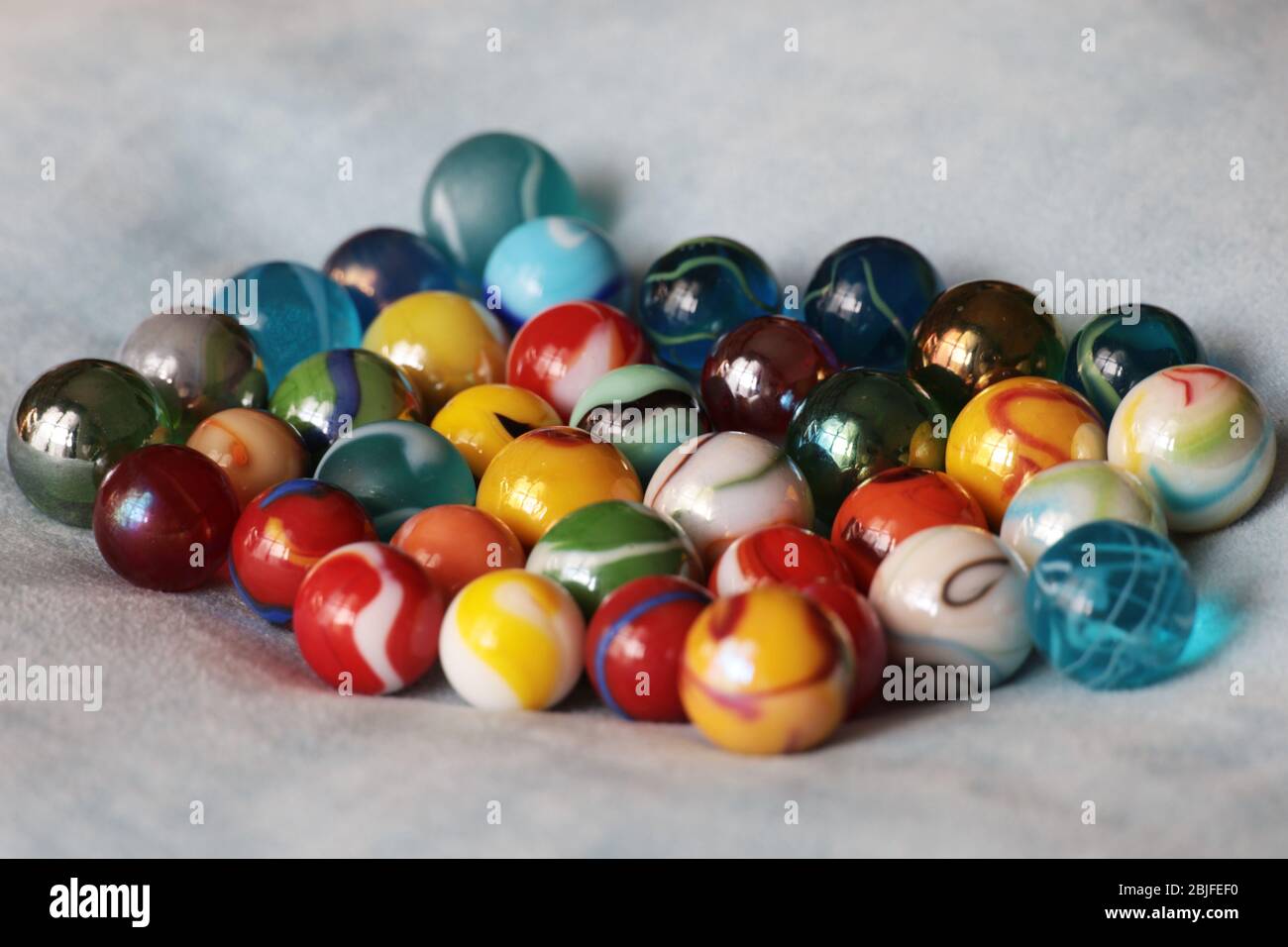 Colourful marbles hi-res stock photography and images - Alamy