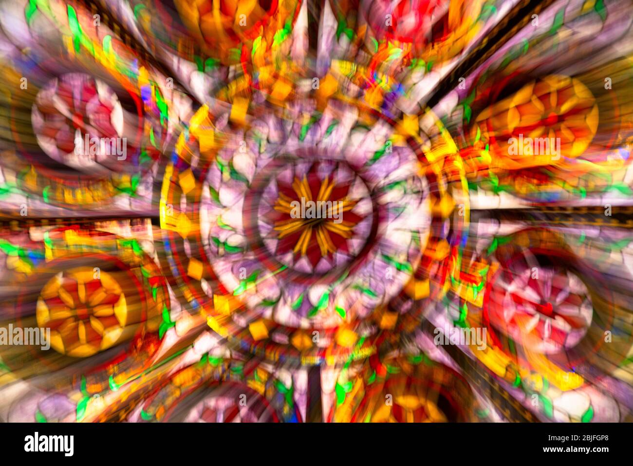 Stain Glass window in the dome of the Paris Casino in Las Vegas using blur effect with slow motion Stock Photo
