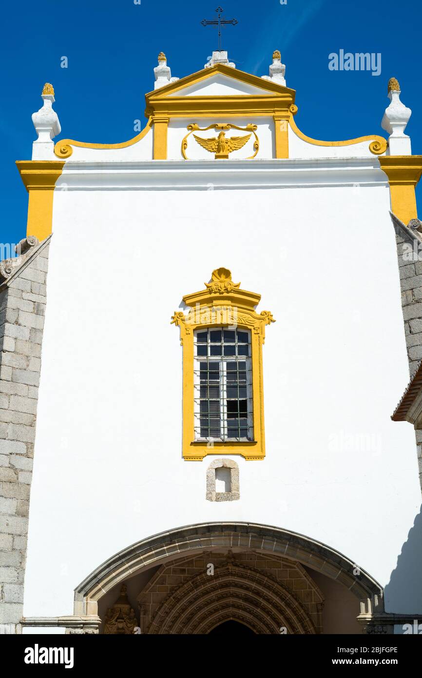 Pousada Convento de Evora, upmarket elegant hotel painted traditional yellow and white, in historic centre of Evora, Portugal Stock Photo