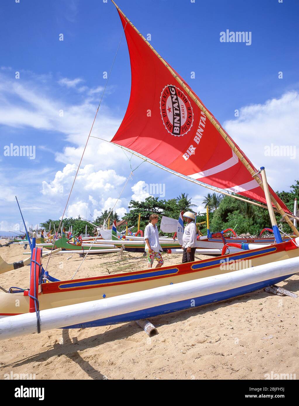 Jukung outrigger sailboats on Sanur Beach, Sanur, Bali, Indonesia Stock Photo