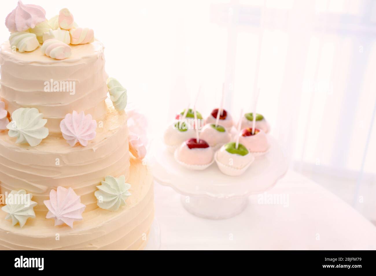 Tasty cake and sweets served on table Stock Photo