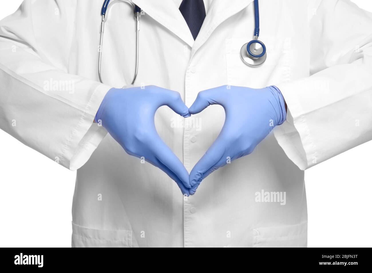 Doctor making heart with his hands on white background Stock Photo - Alamy