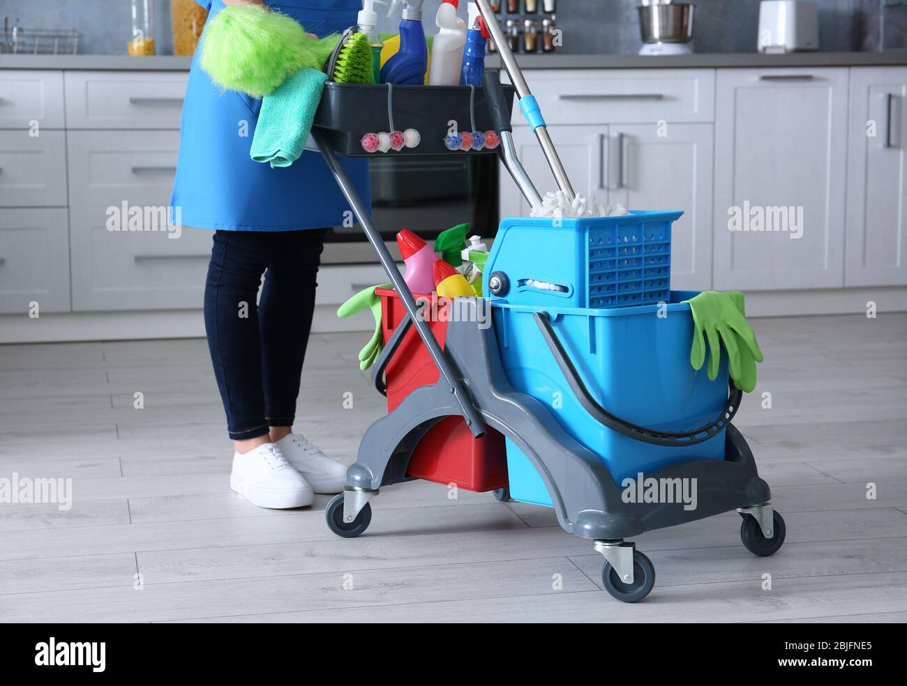 Woman legs mop bucket cleaning hi-res stock photography and images - Alamy