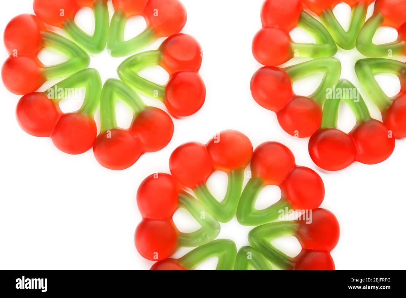 Composition of tasty jelly candies on white background Stock Photo - Alamy