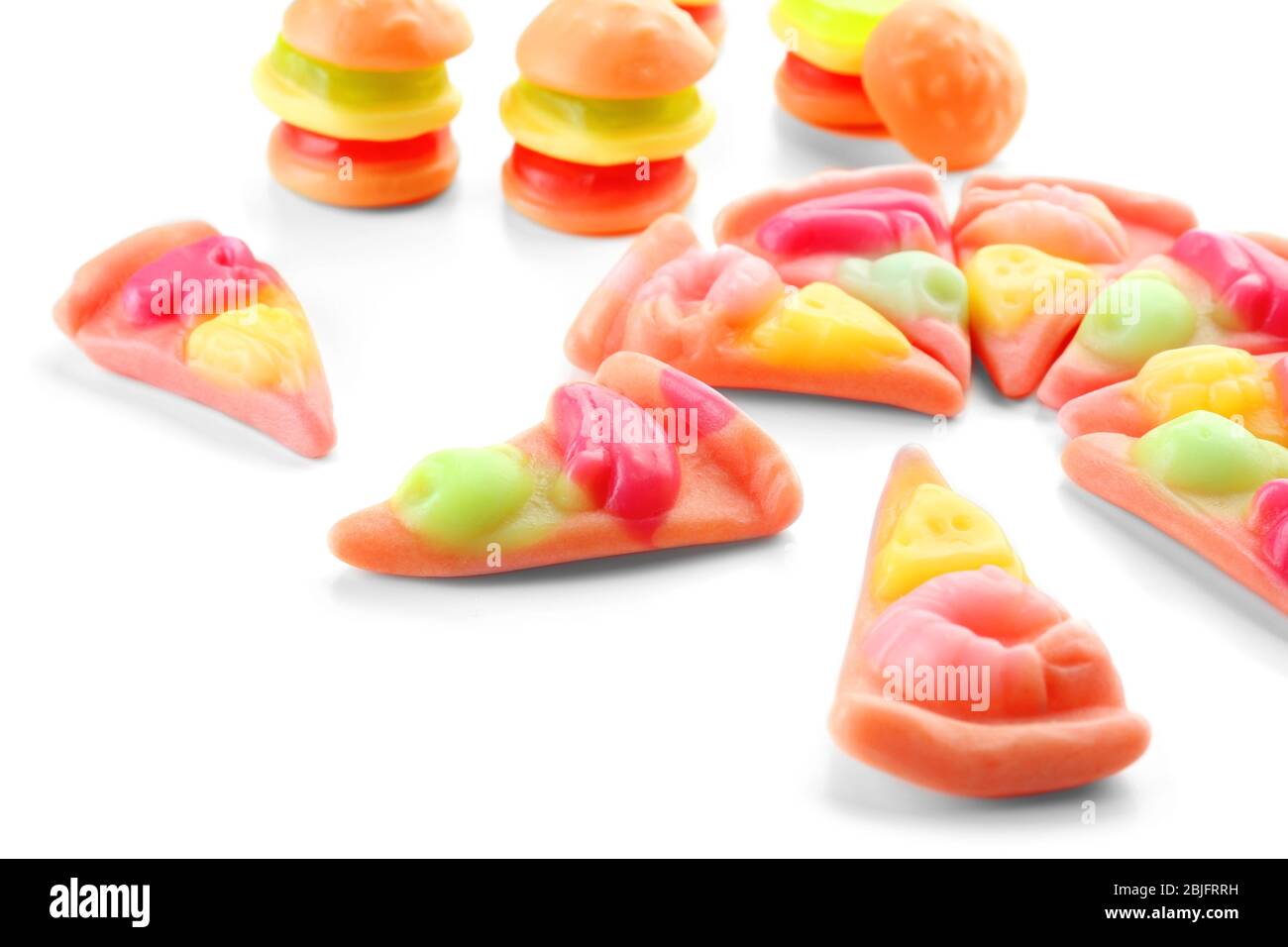 Composition of tasty jelly candies on white background Stock Photo - Alamy