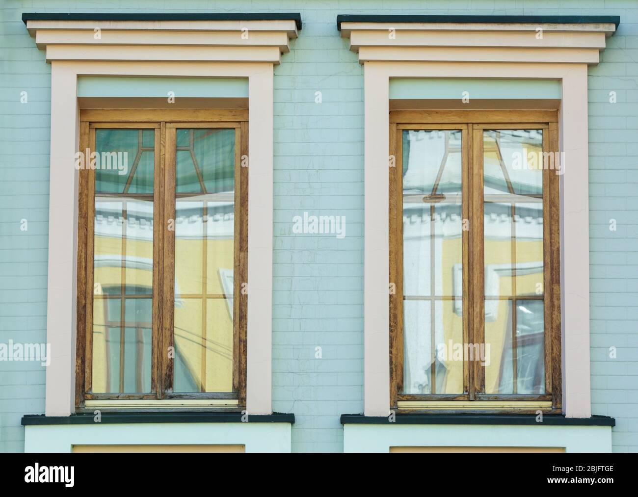 Vintage wooden windows with brick wall background Stock Photo Alamy