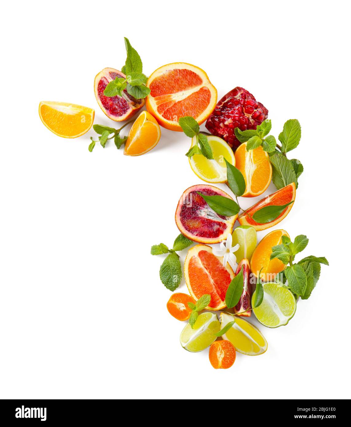 Composition of citrus fruits and green leaves on white background Stock ...