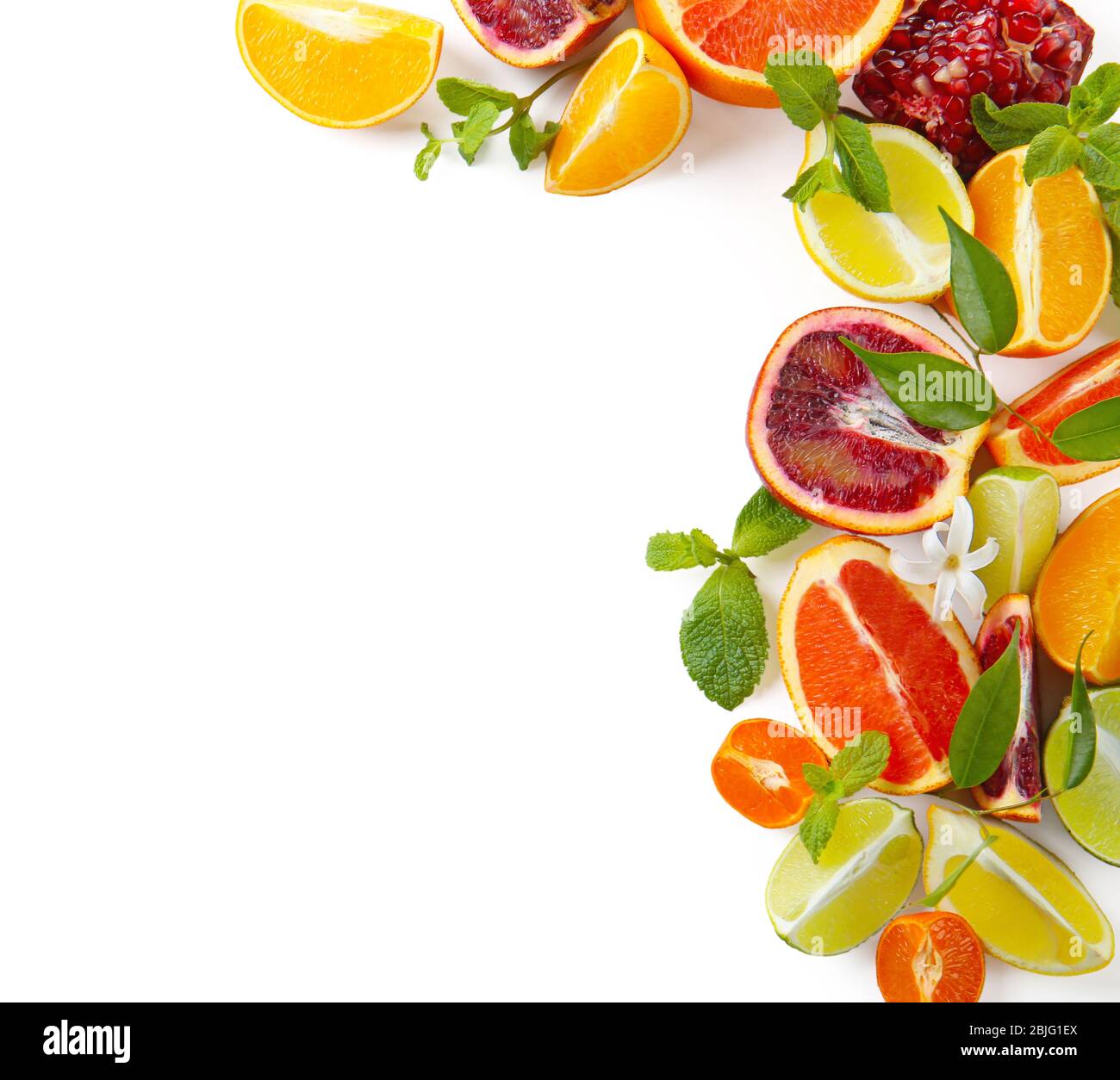 Composition of citrus fruits and green leaves on white background Stock ...