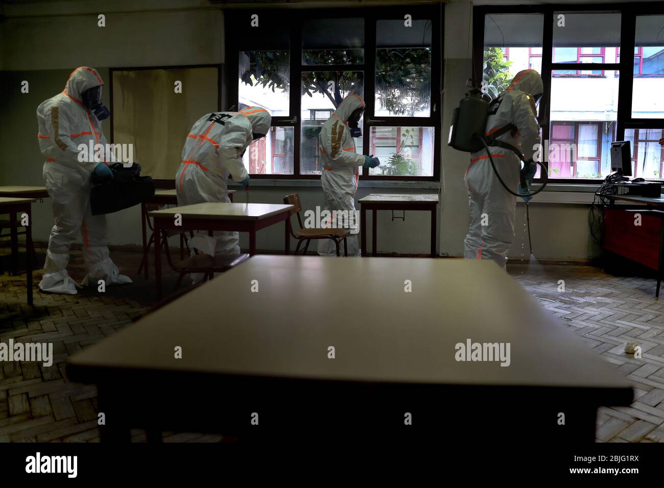 Lisbon, Portugal. 29th Apr, 2020. Portuguese Soldiers wearing protective gear disinfect a high school as the spread of the COVID-19 coronavirus disease continues, in Lisbon, Portugal on April 29, 2020. As Portugal's state of emergency will end on May 2 and the Government expected to reopen high schools in mid-May, more than 400 members of the country's armed forces are carrying out the disinfection of schools. Credit: Pedro Fiuza/ZUMA Wire/Alamy Live News Stock Photo