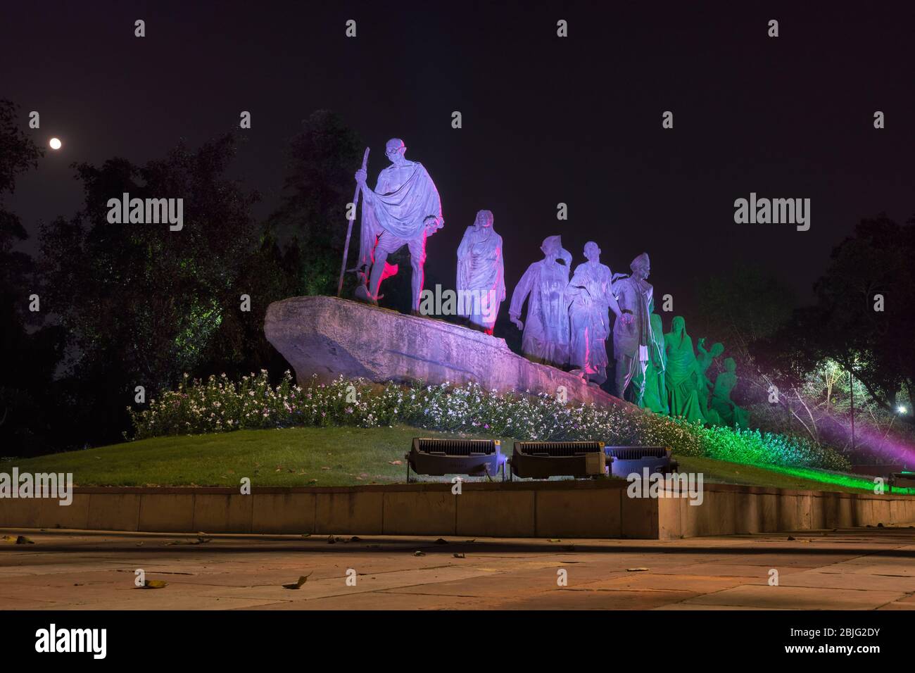 New Delhi / India - September 16, 2019: Dandi March Statue illuminated at night, commemorating the Salt March of 1930, with Gandhi and his followers i Stock Photo