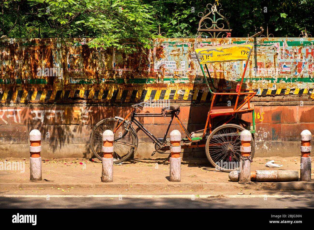 New Delhi / India - September 19, 2019: Old time-worn bicycle rickshaw, streets of New Delhi, India Stock Photo