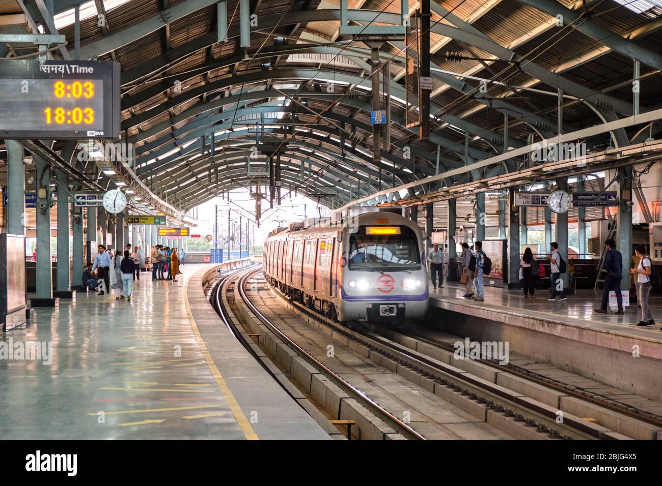 New Delhi / India - September 19, 2019: Train arrives at metro station of Delhi Metro system Stock Photo