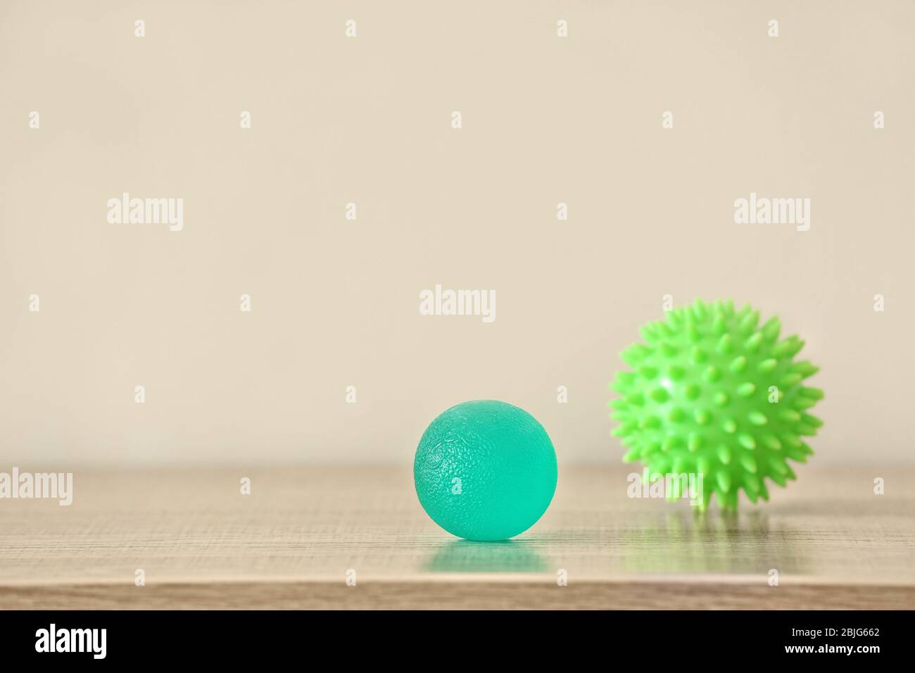 Two rubber balls on light background Stock Photo Alamy