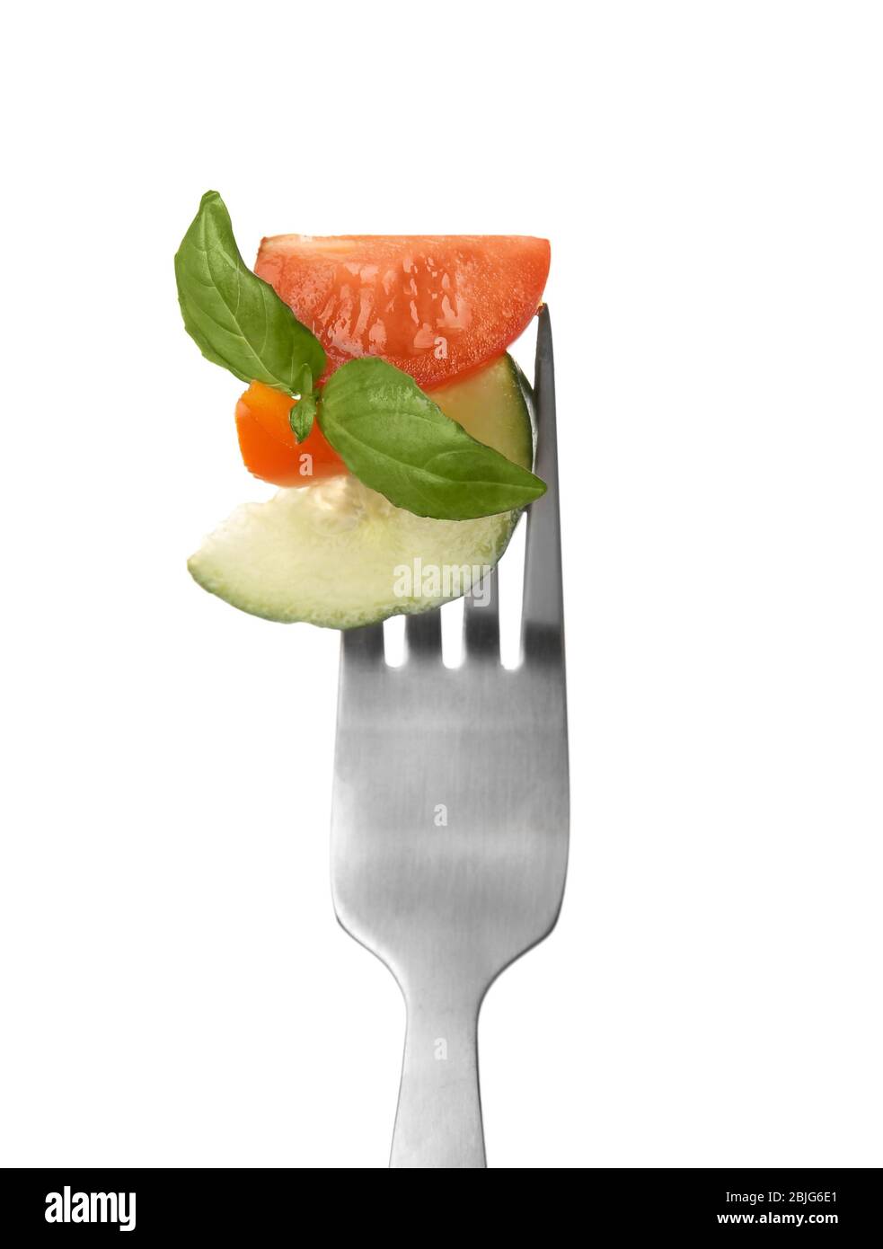 Fork with pinned snack on white background Stock Photo