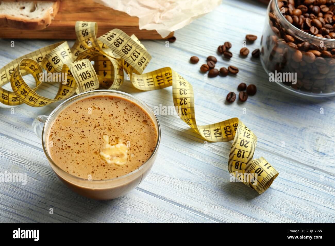 Composition with tasty butter coffee on wooden table Stock Photo