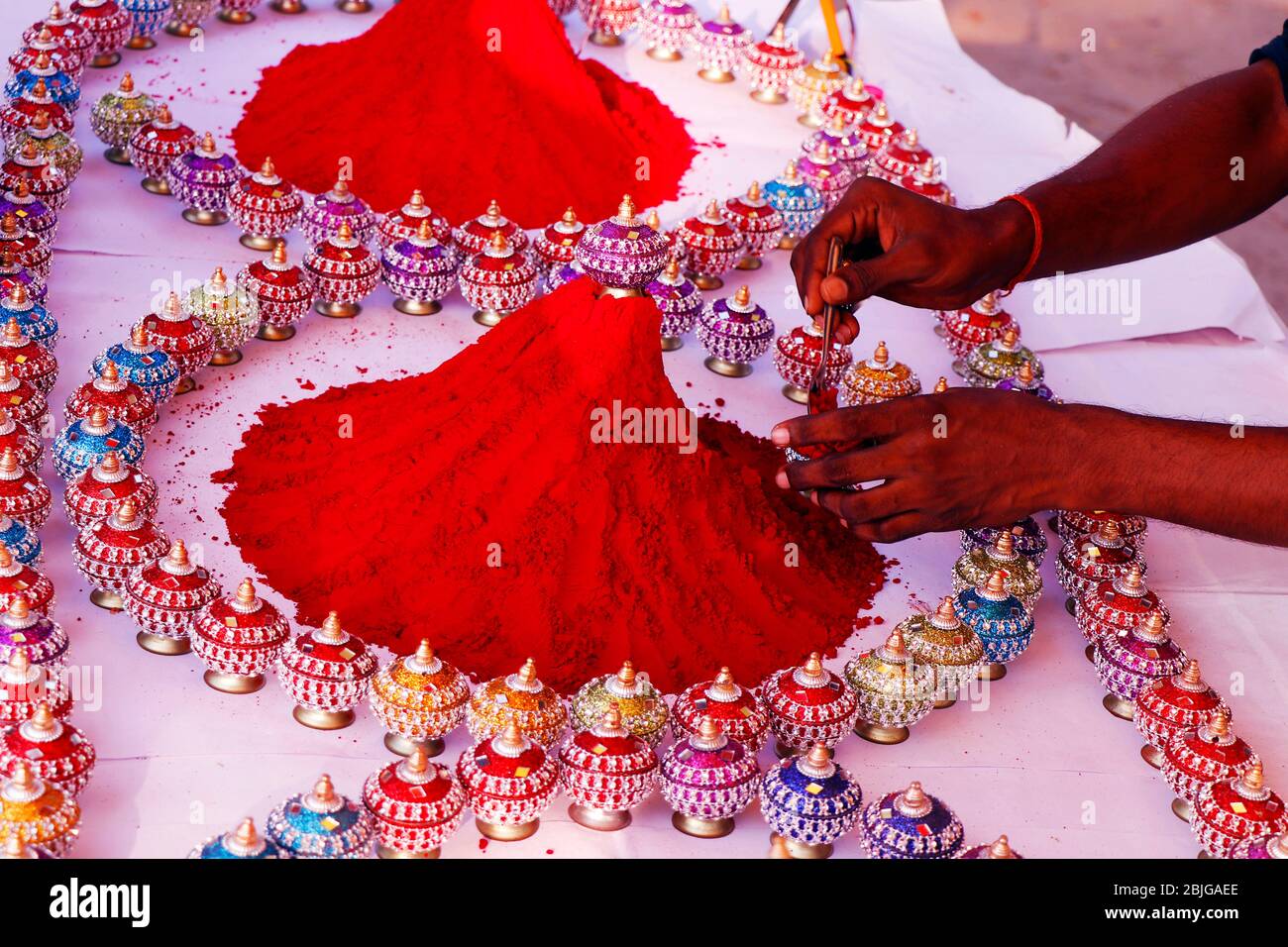 Red color Kumkum or Vermilion for sale in a street in fort kochi India Stock Photo