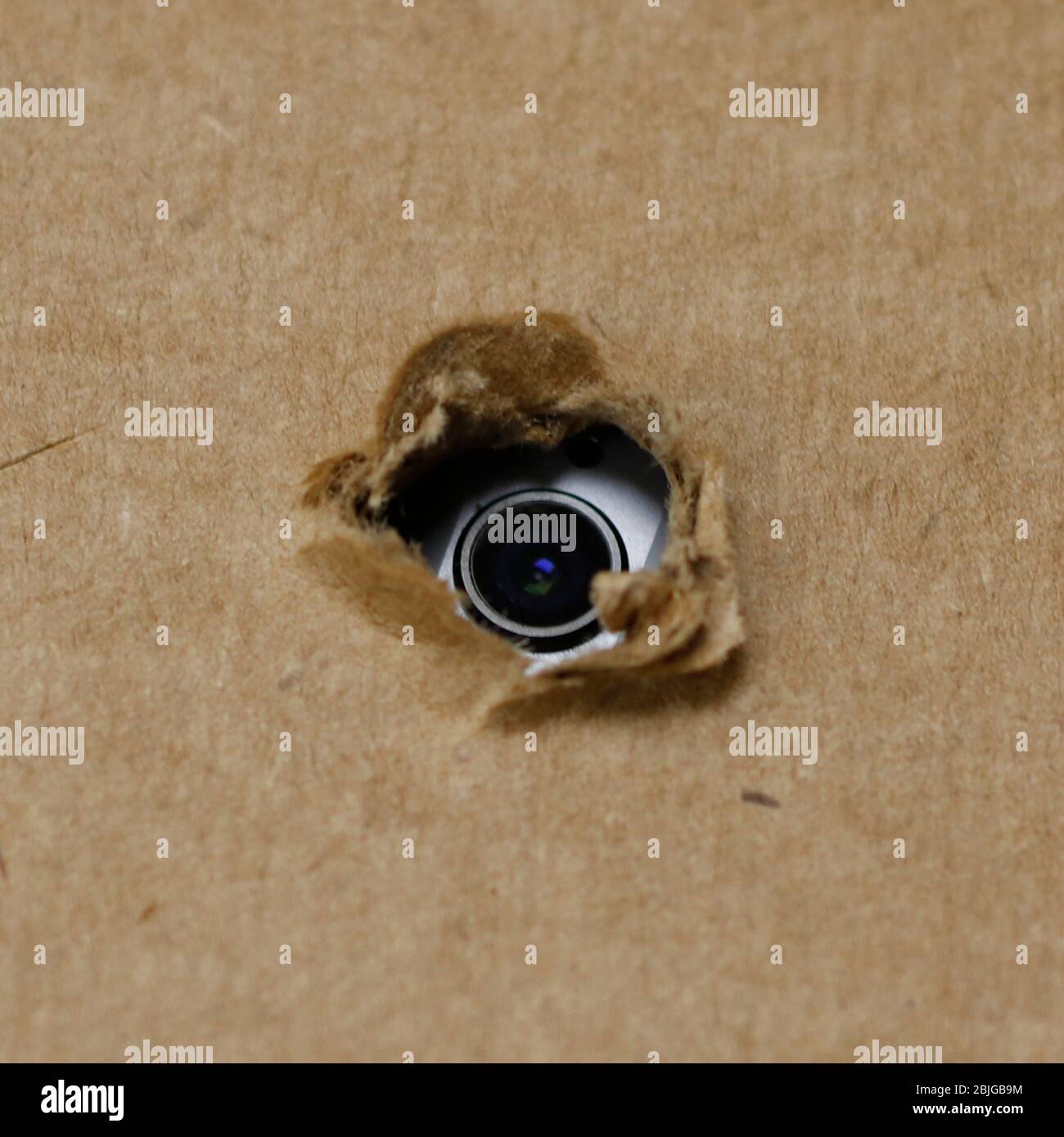 spy camera hidden fixed behind the cardboard or roof Stock Photo - Alamy