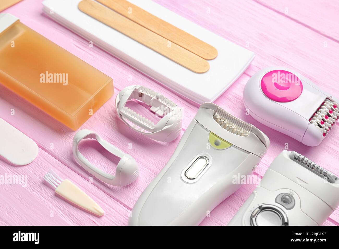 Set for epilation on wooden background Stock Photo - Alamy
