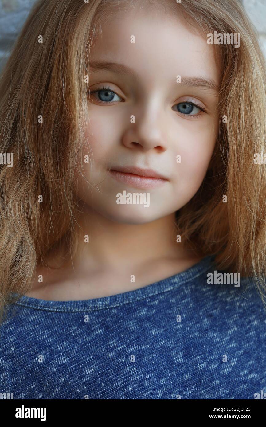 Portrait of cute little girl with long hair Stock Photo - Alamy
