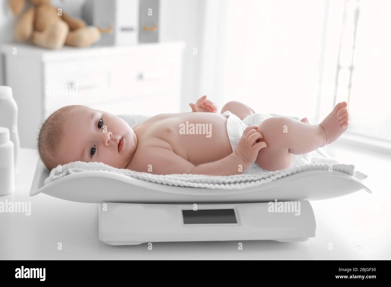 Closeup of 1 Months Old Newborn Baby Boy Lying on Digital Scales or Weighs.  Concept of Babies and Newborn Hygiene and Stock Photo - Image of growth,  girl: 208995290