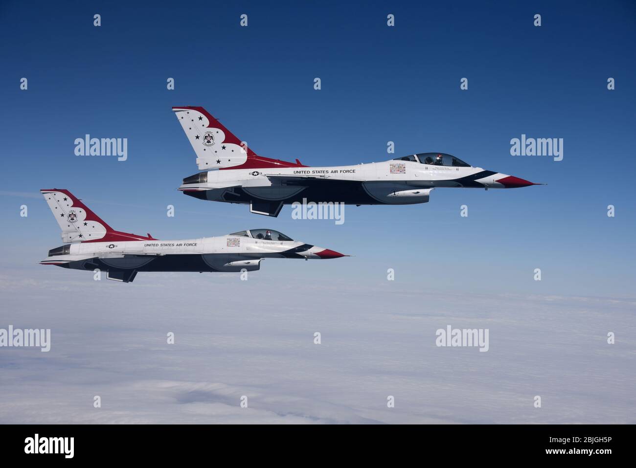 U.S. Air Force Thunderbird F-16 Fighting Falcons fly in support of the America Strong campaign, April 28, 2020. The KC-10 Extenders assigned to Joint Base McGuire-Dix-Lakehurst, N.J., refueled the Thunderbirds and U.S. Navy Blue Angels during the America Strong flyovers of New York, New Jersey and Philadelphia to honor the healthcare workers, essential employees, military personnel and other first responders on the front line of the battle against COVID-19. (U.S. Air Force photo by 1st Lt. Katie Mueller) Stock Photo