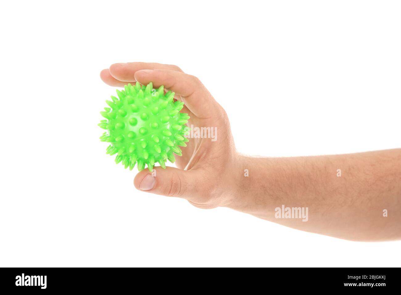Male hand with stress ball on white background Stock Photo