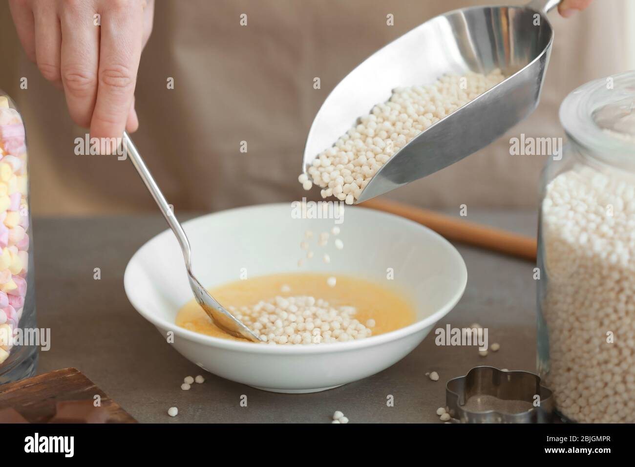 Adding puffed rice hi-res stock photography and images - Alamy