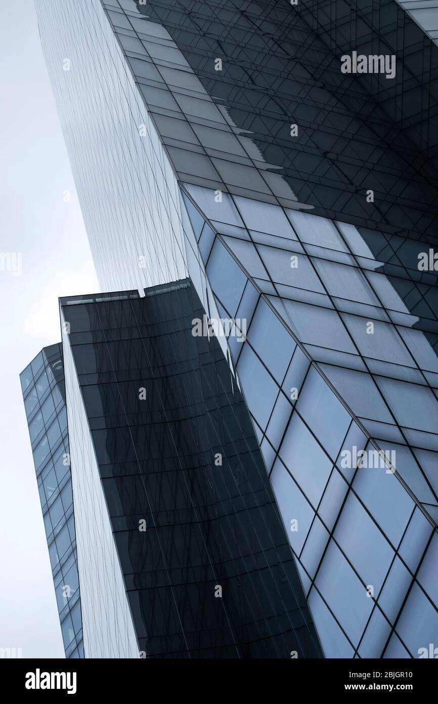Abstract angle and reflections of urban architecture Stock Photo