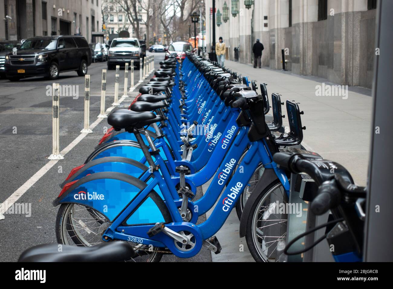 Row of blue rental Citi bikes on a Manhattan street ready for hire Stock Photo