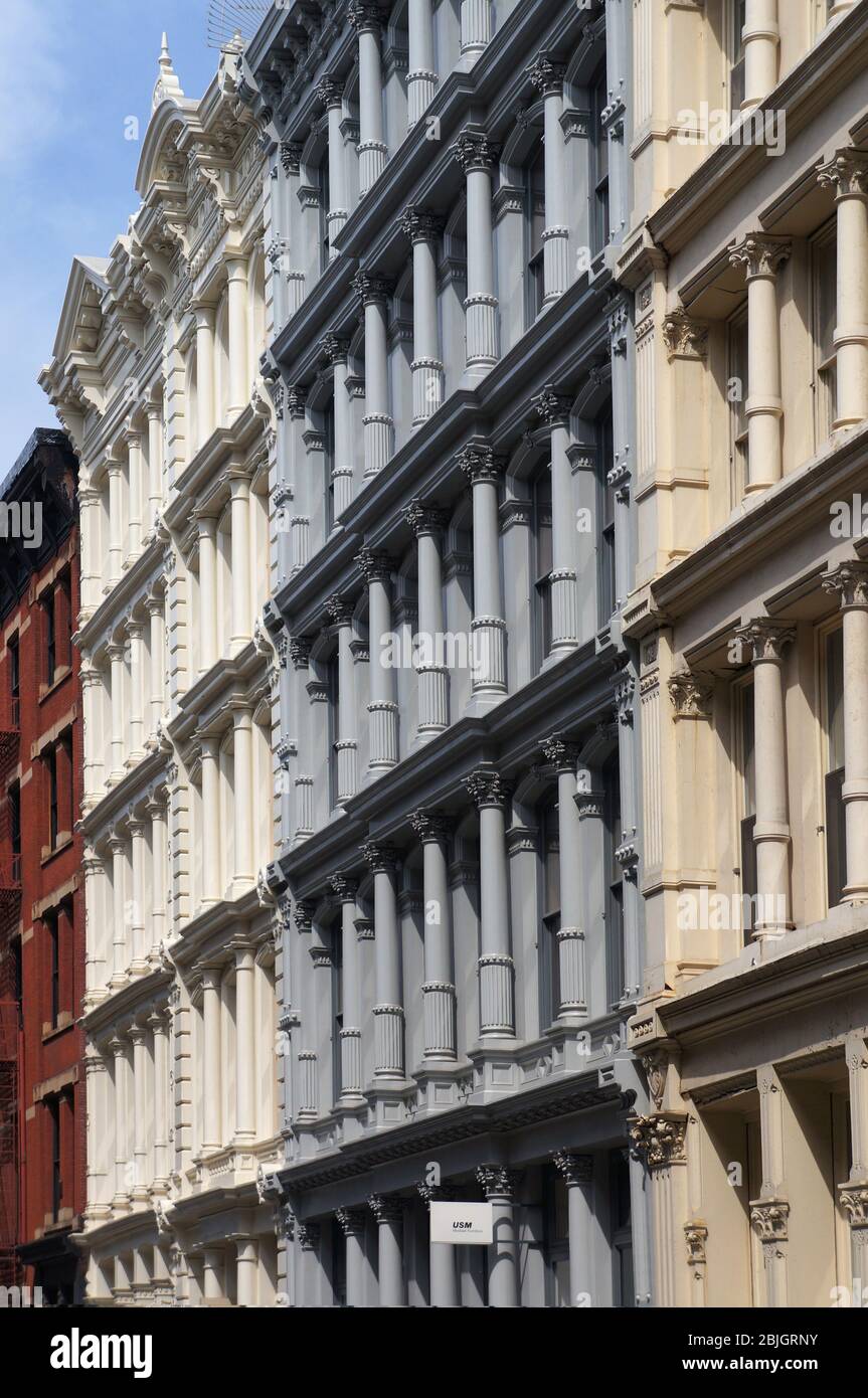 row of historic cast iron buildings in Soho in lower Manhattan, New York City Stock Photo
